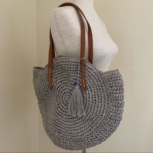 Capelli Strawworld Inc Gray Straw Circular Tote with Tassel